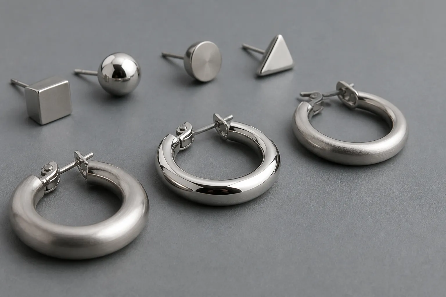 Boucles d'oreilles acier inoxydable vs alternatives : le guide comparatif