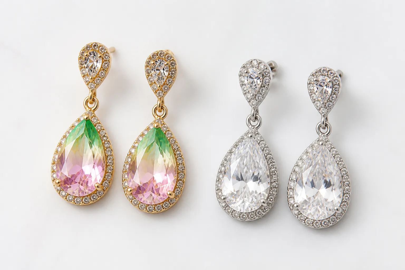 comprar en china - Comparativa de acabados de pendientes de gota: cristal degradado chapado en oro versus rhinestone chapado en rodio (acabado tipo plata), sobre fondo blanco neutro con etiquetas de material y MOQ